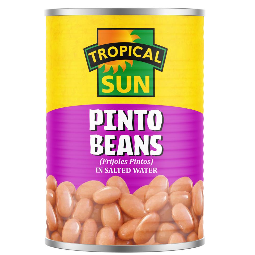 A tin can of Tropical Sun Pinto Beans, showing the beans inside and the brand's logo and product name on the label.